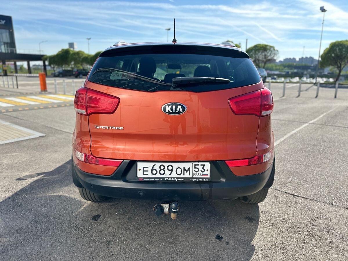 Kia Sportage 2.0 AT (150 л.с.), 2014, III поколение Рестайлинг, Оранжевый с  пробегом - купить в Санкт Петербурге у официального дилера ИАТ